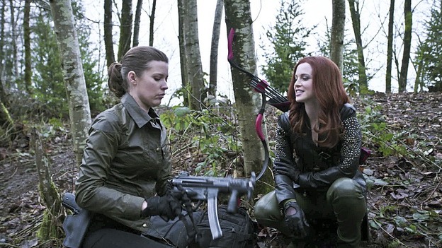 Arrow--"Suicidal Tendencies"--Image AR317A_0002b--Pictured (L-R): Audrey Marie Anderson as Lyla Michaels and Amy Gumenick as Cupid--Photo: Katie Yu/The CW--é 2015 The CW Network, LLC. All rights reserved.