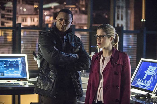 Arrow -- "Al Sah-Him" -- Image AR321B_0243b -- Pictured (L-R): David Ramsey as John Diggle and Emily Bett Rickards as Felicity Smoak -- Photo: Cate Cameron/The CW -- é 2015 The CW Network, LLC. All Rights Reserved.
