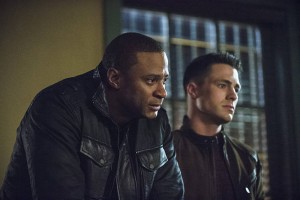 Arrow -- "Public Enemy" -- Image AR318B_0329b -- Pictured (L-R): David Ramsey as John Diggle and Colton Haynes as Roy Harper -- Photo: Cate Cameron/The CW -- é 2015 The CW Network, LLC. All Rights Reserved.