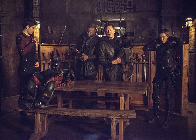 Arrow -- "My Name is Oliver Queen" -- Image AR323A_0302b -- Pictured (L-R): Brandon Routh as Ray Palmer, David Ramsey as John Diggle, John Barrowman as Malcolm Merlyn, Katie Cassidy as Laurel Lance -- Photo: Cate Cameron/The CW -- é 2015 The CW Network, LLC. All Rights Reserved.