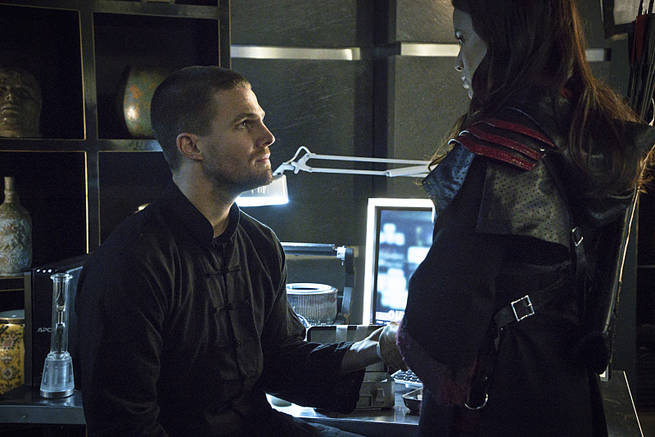 Arrow -- "My Name is Oliver Queen" -- Image AR323B_0269b -- Pictured (L-R): Stephen Amell as Oliver Queen and Katrina Law as Nyssa al Ghul -- Photo: Liane Hentscher/The CW -- é 2015 The CW Network, LLC. All Rights Reserved.