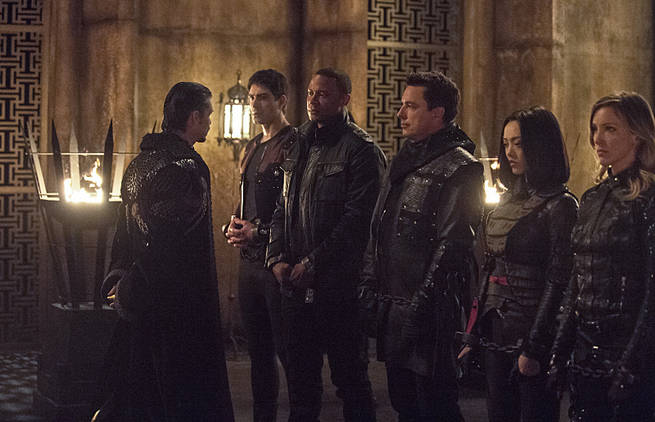 Arrow -- "This is Your Sword" -- Image AR322B_0077b -- Pictured (L-R): Brandon Routh as Ray Palmer, David Ramsey as John Diggle, John Barrowman as Malcolm Merlyn, Rila Fukushima as Tatsu Yamashiro and Katie Cassidy as Laurel Lance -- Photo: Cate Cameron/The CW -- é 2015 The CW Network, LLC. All Rights Reserved.