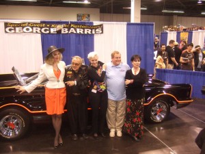Julie Newmar, George Barris, Lee Meriwether, Burt Ward, and Yvonne Craig in front of the Batmobile