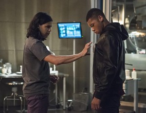 The Flash -- "The Fury of Firestorm" -- FLA204A_0259b2 -- Pictured (L-R): Carlos Valdes as Cisco Ramon and Franz Drameh as Jax Jackson -- Photo: Cate Cameron /The CW -- é 2015 The CW Network, LLC. All rights reserved.