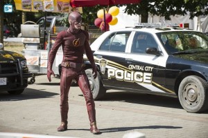 The Flash -- "The Man Who Saved Central City" -- Image FLA201a_0307b -- Pictured (L-R): Grant Gustin as The Flash-- Photo: Cate Cameron /The CW -- é 2015 The CW Network, LLC. All rights reserved