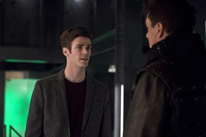The Flash -- "Legends of Today" -- Image FLA208B_0140b.jpg -- Pictured (L-R): Grant Gustin as Barry Allen and John Barrowman as Malcolm Merlyn -- Photo: Cate Cameron /The CW -- é 2015 The CW Network, LLC. All rights reserved.