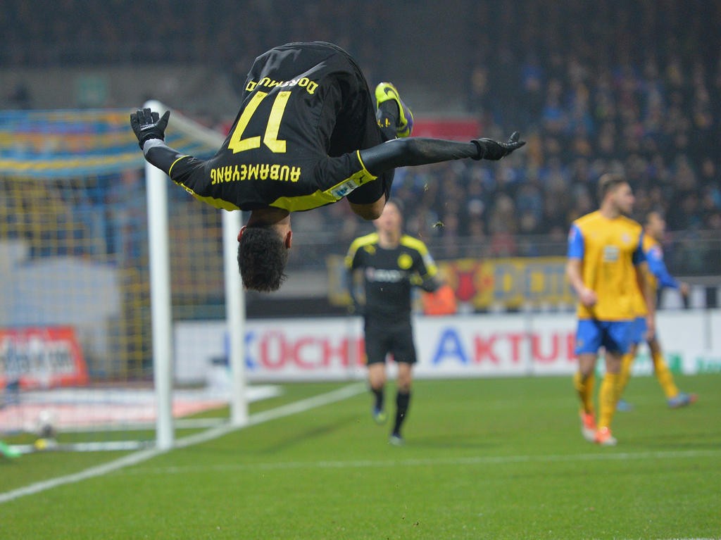 BRAUNSCHWEIG, GERMANY - JANUARY 31: Pierre-Emerick Aubameyang of Dortmund icelebrates scoring his second goal during the Bundesliga match between Eintracht Braunschweig and Borussia Dortmund at Eintracht Stadion on January 31, 2014 in Braunschweig, Germany. (Photo by Stuart Franklin/Bongarts/Getty Images)