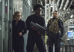 Arrow -- "Lost Souls" -- Image AR406A_0166b.jpg -- Pictured (L-R): Emily Bett Rickards as Felicity Smoak, Echo Kellum as Curtis Holt and David Ramsey as John Diggle -- Photo: Cate Cameron/ The CW -- é 2015 The CW Network, LLC. All Rights Reserved.