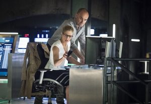 Arrow -- "Lost in the Flood" -- Image AR422a_0009b.jpg -- Pictured (L-R): Emily Bett Rickards as Felicity Smoak and Paul Blackthorne as Detective Quentin Lance -- Photo: Dean Buscher/The CW -- é 2016 The CW Network, LLC. All Rights Reserved.