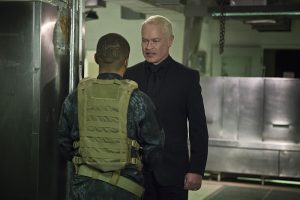 Arrow -- "Genesis" -- Image AR420a_0407b.jpg -- Pictured (L-R): Eugene Byrd as Andy Diggle and Neal McDonough as Damien Darhk -- Photo: Diyah Pera/The CW -- é 2016 The CW Network, LLC. All Rights Reserved.