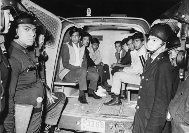 Captured Student Rioters In Police Van