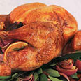 Roast Turkey with Oranges, Bay Leaves, Red Onions, and Pan Gravy