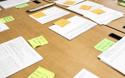 Photo of table with various worksheets laid out for students
