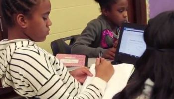 Photo of students working independently at classroom table