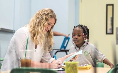 Photo of teacher and student working together at a table