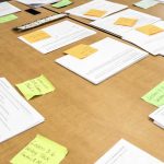 Photo of table with various worksheets laid out for students