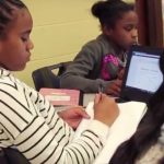 Photo of students working independently at classroom table