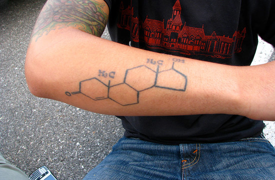photo of man's arm with testosterone tatoo
