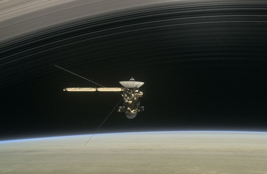 illustration of the Cassini spacecraft within the rings of Saturn