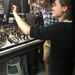 Physics student Noah Huffman with an experiment apparatus