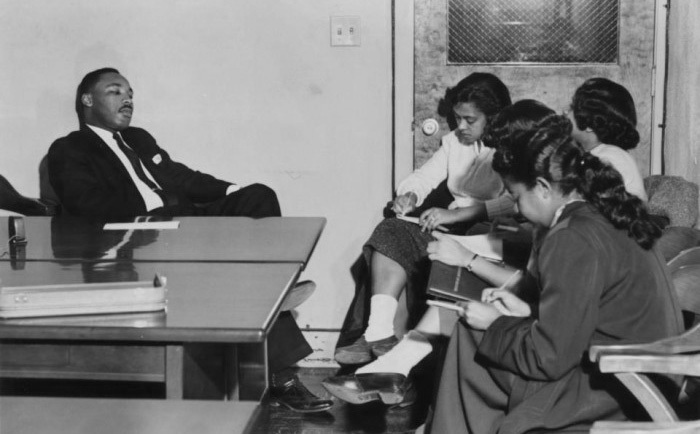 Dr. Martin Luther King, Jr. on campus at Bennett College being interviewed by Bennett Belles when he spoke there 60 years ago in 1958/Photo Credit: Bennett College