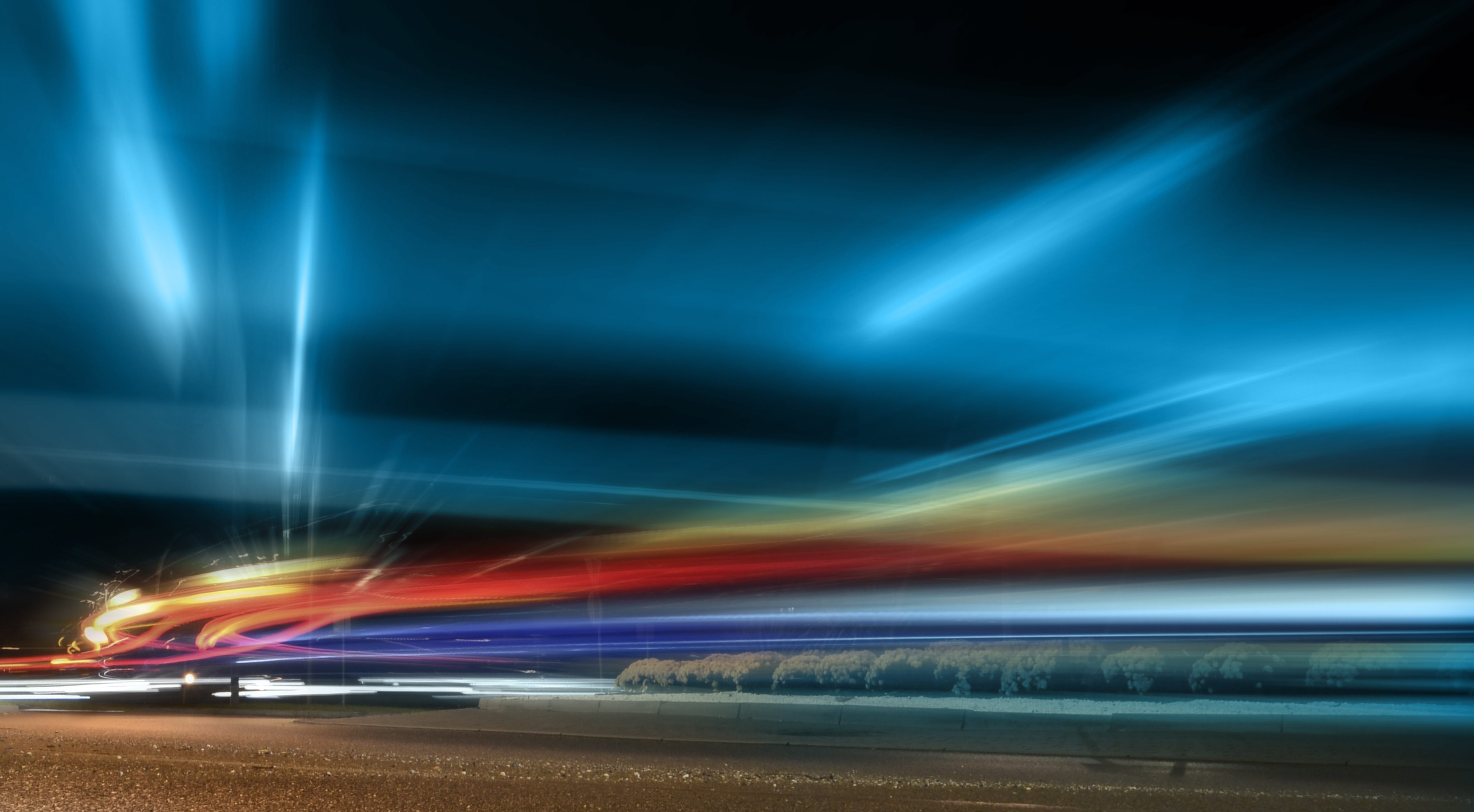 Car blurred on the street.