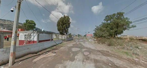 Encuentran cuerpo de mujer flotando en cisterna de Amozoc