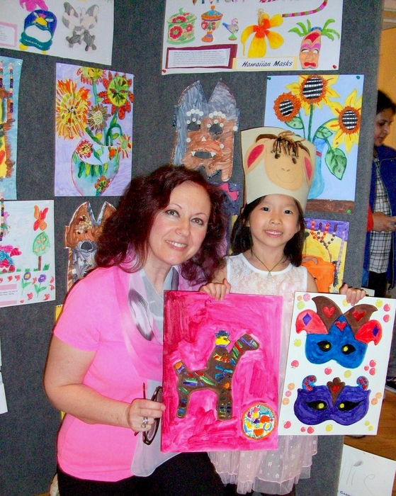 Natalya B. Parris with her student at art show and reception for “Art Around the World” camp April 6 – 10, 2015, for students 5 – 9 year old on 4/10 at the Gaithersburg Arts Barn 301-258-6394, MD