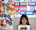 Student with her artwork; Montgomery County Recreation Summer Fun Center in July 2015