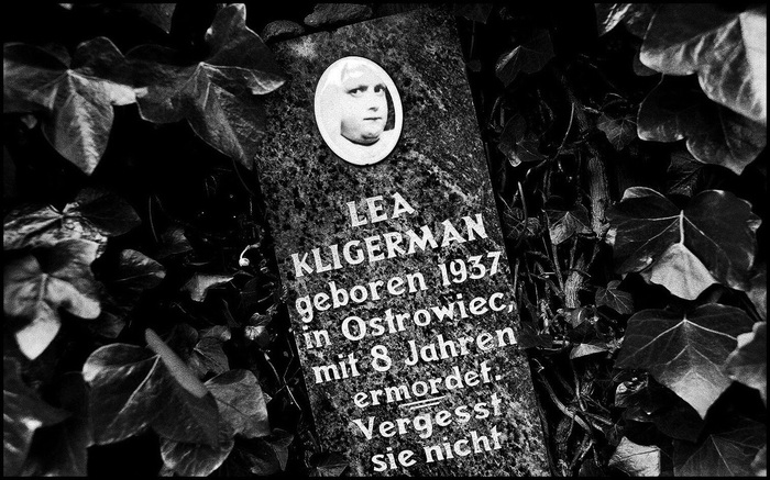 26. The memorial stone with a picture of Lea Kligerman...