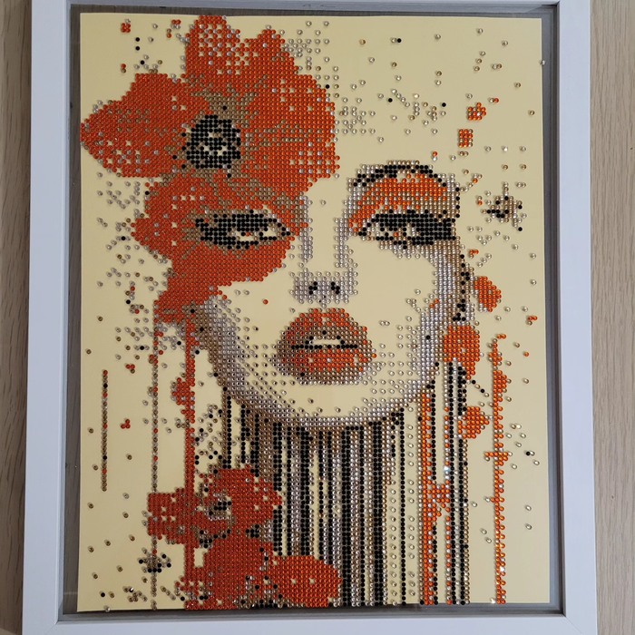 Crystal art portrait made on glass with rhinestones