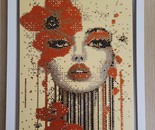 Crystal art portrait made on glass with rhinestones