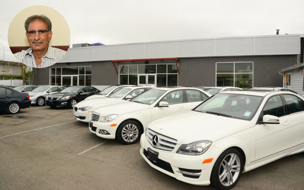 New showroom, almost ready to display cars. Ajit Hare, owner inset. Photo: Ray Hudson