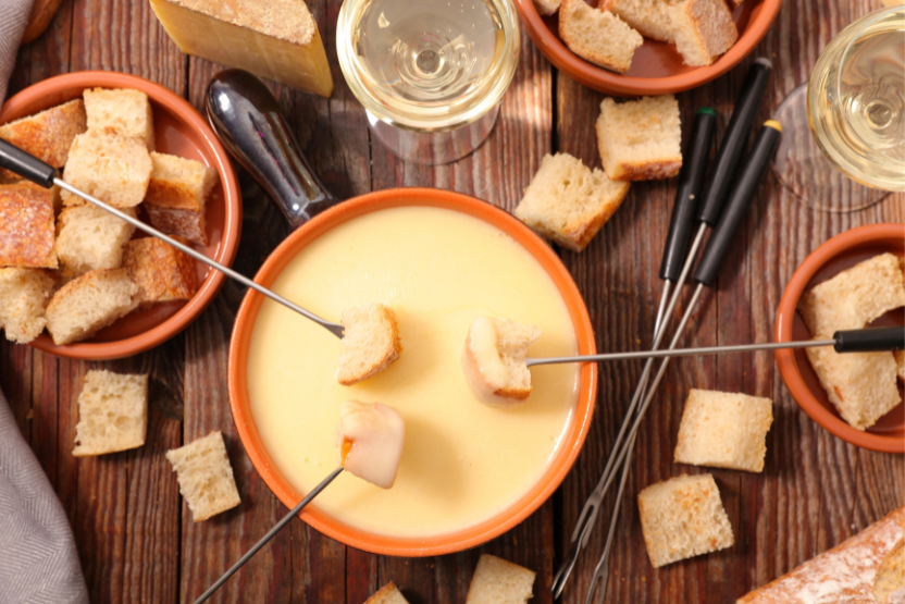 Dog-friendly cheese fondue with bread and accoutrements for valentines day