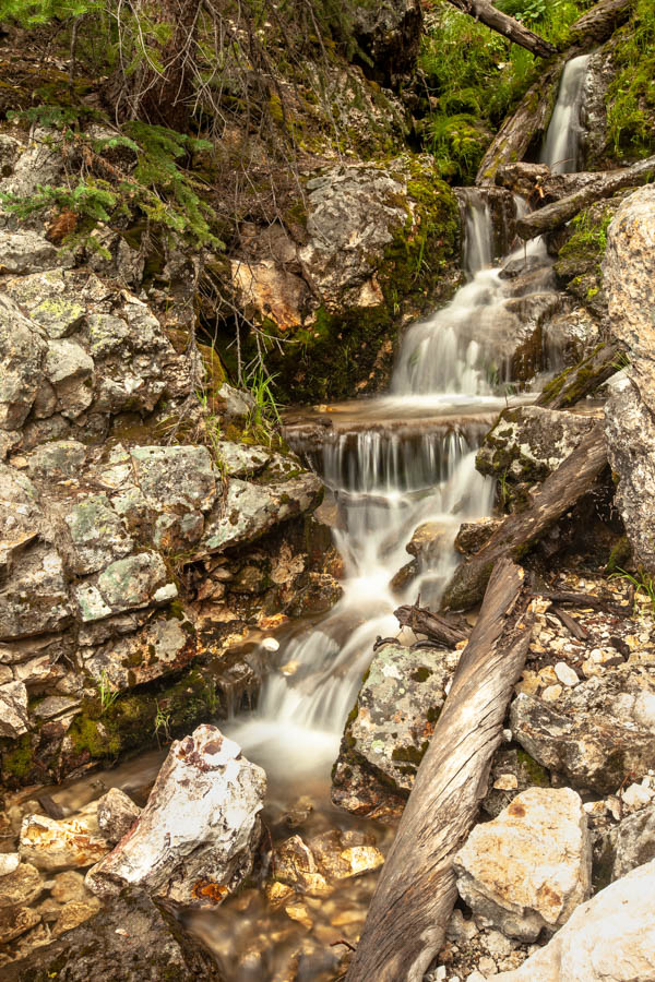 Flowing creek bed, Yellowstone National Park - How to Photograph Silky Waterfalls #vezzaniphotography