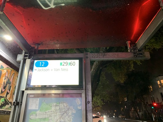 Bus shelter showing 12 bus in 29 and 60 minutes
