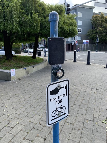 A button labeled “Push button for (bicycle)”