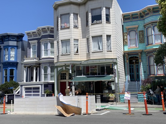 Under-construction parklet at Hila from street side