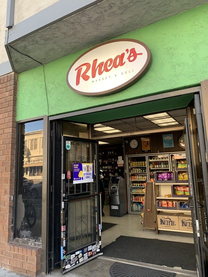 Rhea’s Deli storefront with Yes on I, Affordable Homes for All