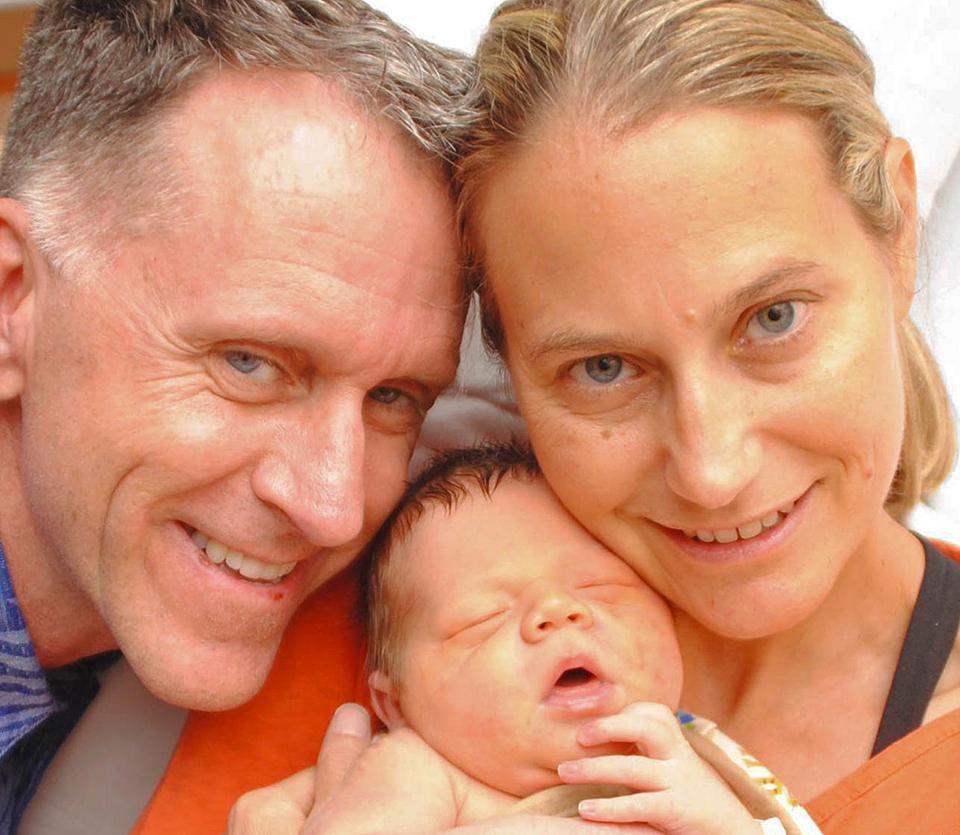 Rick-and-laura-and-adopted-baby
