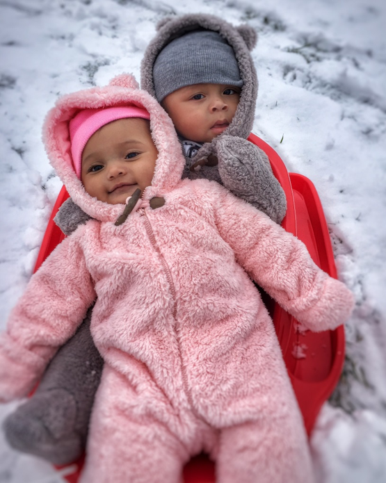 Daughter and son snow