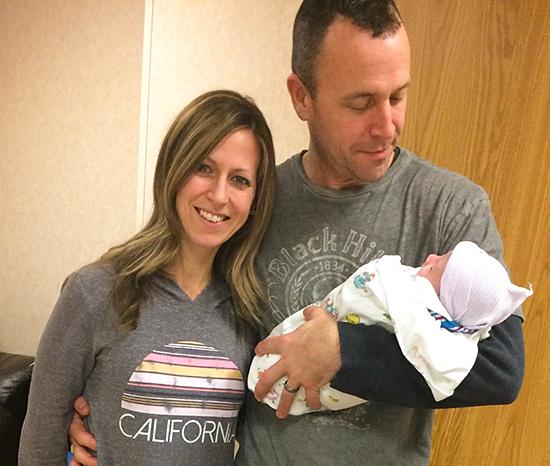 Holding-our-adopted-baby