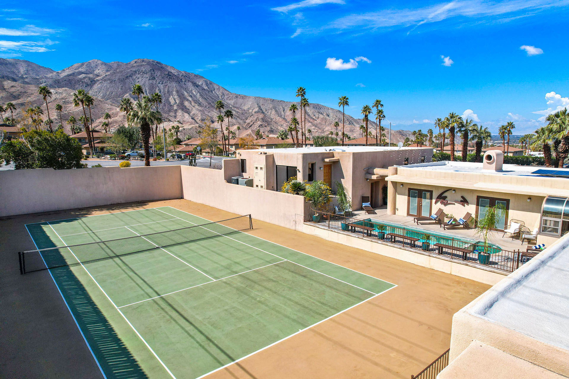 El Paseo Tennis Retreat 6 BR w/ Private Court | Photo 6