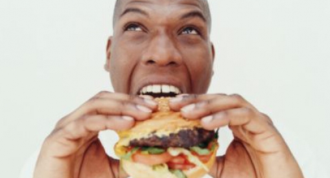 0-634528619-maneatingburger