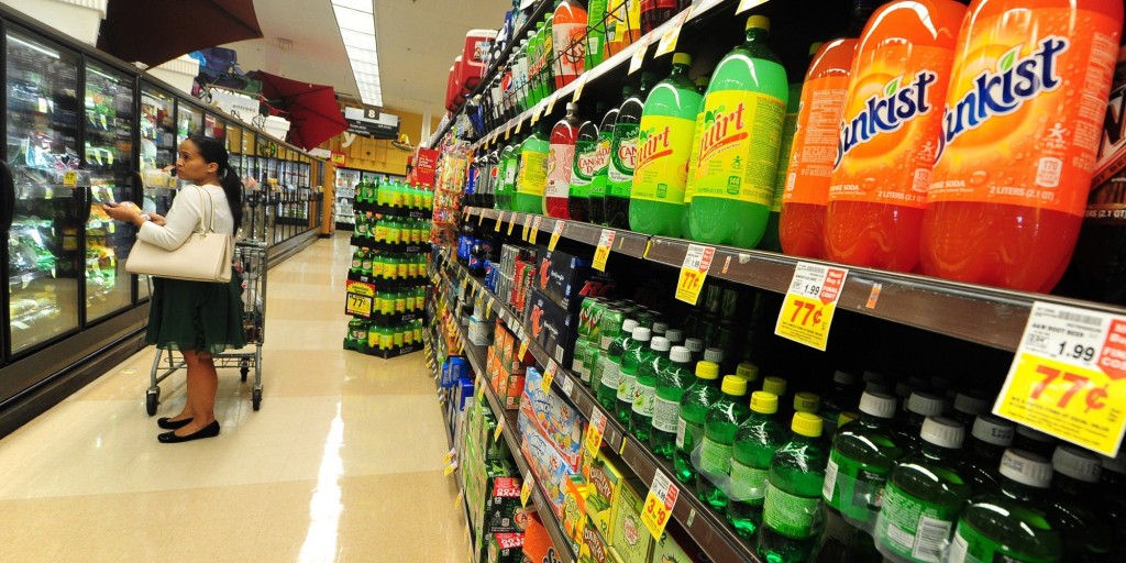 A woman shops for frozen foods on an aisle across from sodas and other sugary drinks for sale at a superrmarket in Monterey Park, California on June 18, 2014, a day after a bill in California that would require soft drinks to have health warning labels failed to clear a key committee. Under the measure, sugary drinks sold in the most populous US state would have had to carry a label with a warning that sugar contributes to obesity, diabetes and tooth decay and the legislation, which would have been the first of its kind in the United States, passed the state Senate in May, but on it failed to win enough votes in the health commission of the California State Assembly on June 17, the Los Angeles Times reported. AFP PHOTO/Frederic J. BROWN (Photo credit should read FREDERIC J. BROWN/AFP/Getty Images)