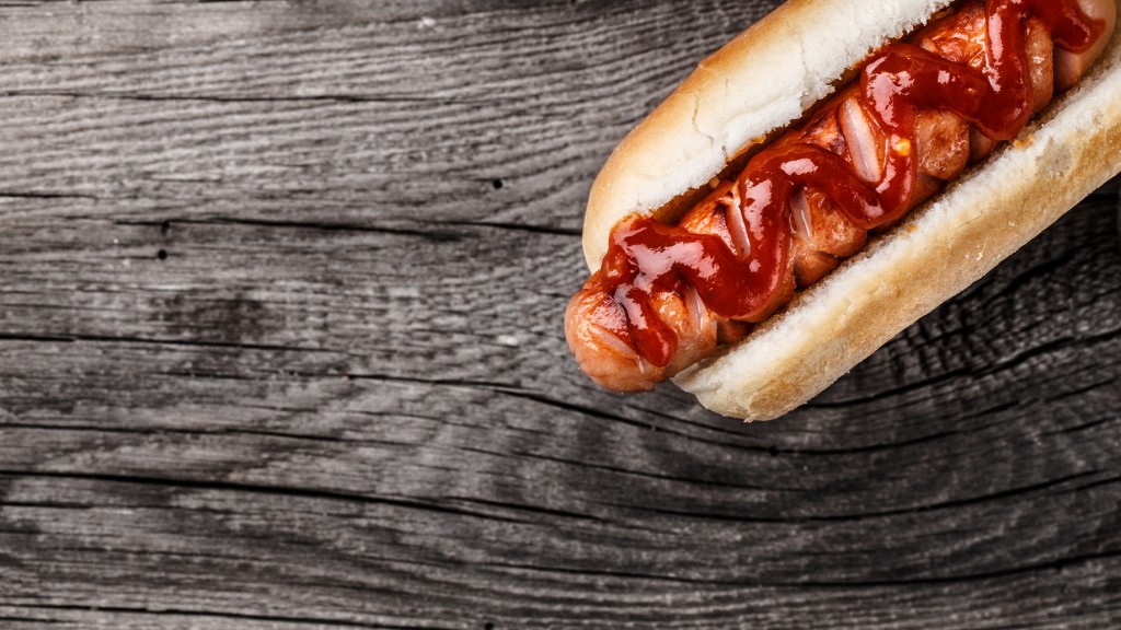 Barbecue grilled hot dog on a wooden board