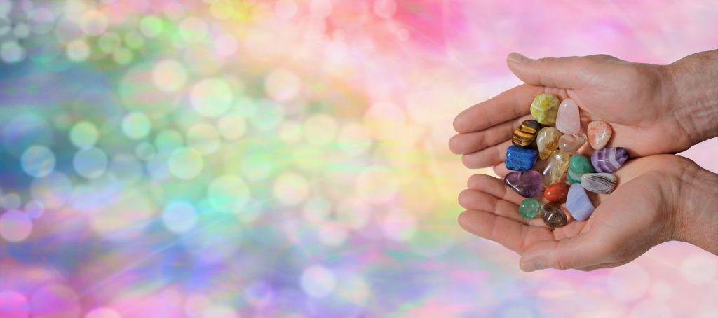 Male Crystal Healer on Rainbow Bokeh Banner