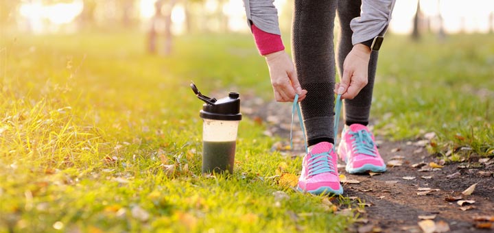 exercise-woman-tying-shoes