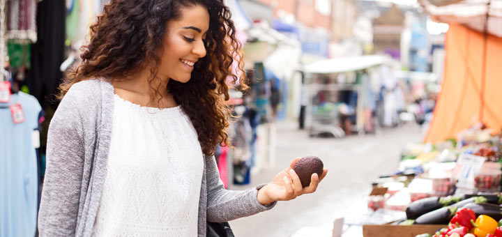 woman-holding-avocado