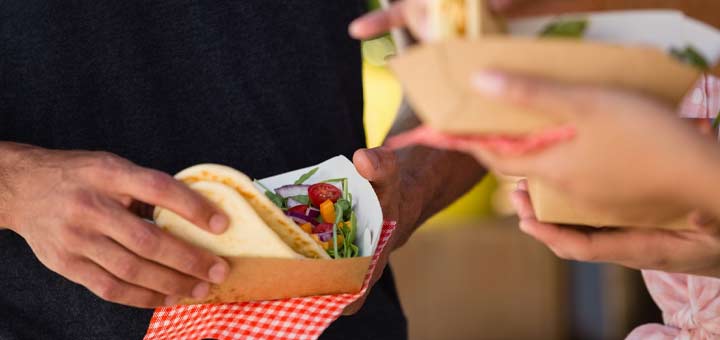 group-holding-tacos